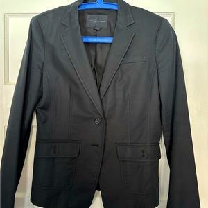 Double button, stretch, lined, black jacket.